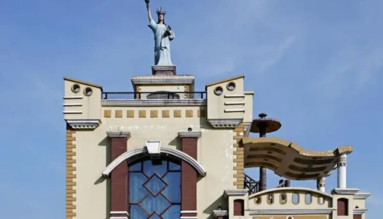 NRI Today - Statue of Liberty Replica on NRI's Roof in India